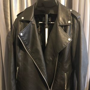 Forever21 leather jacket zip up front pockets and sleeves /w silver detailing